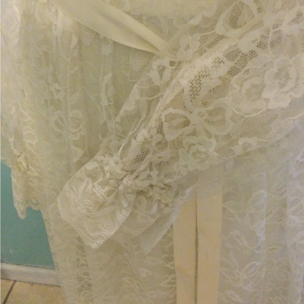 Ivory lace wedding gown